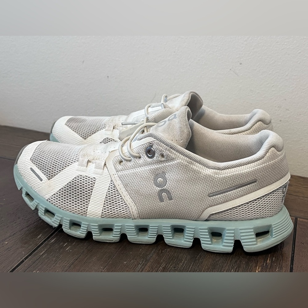 On Cloud White and Light Blue Athletic Shoes